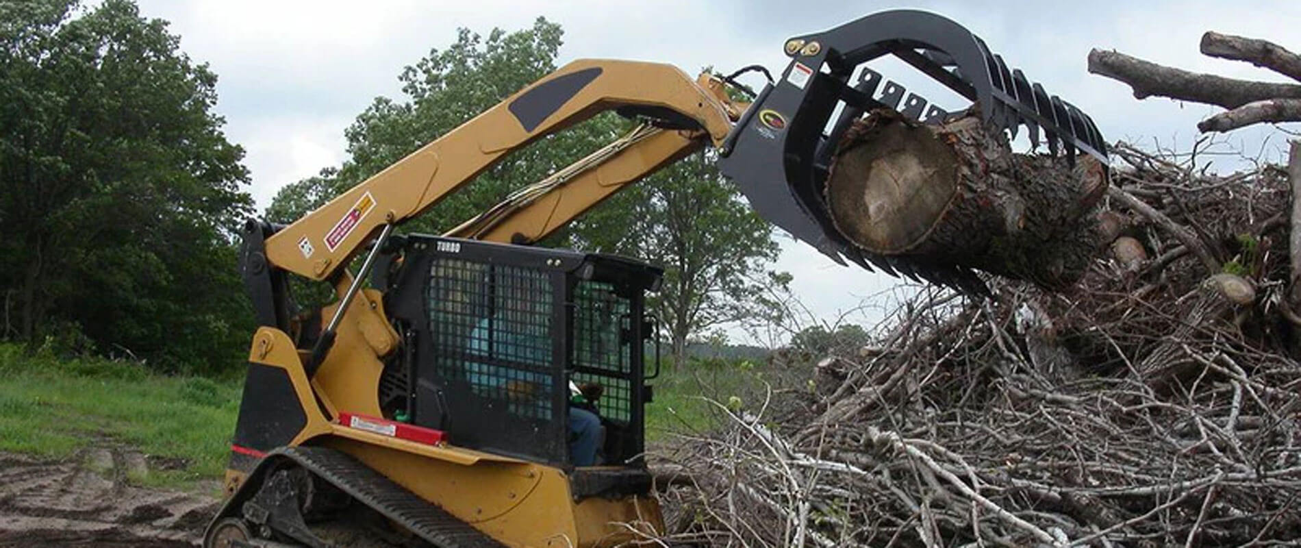 Hpbannereagletalonskidsteerlog Brushandrockgrapple 7 800x